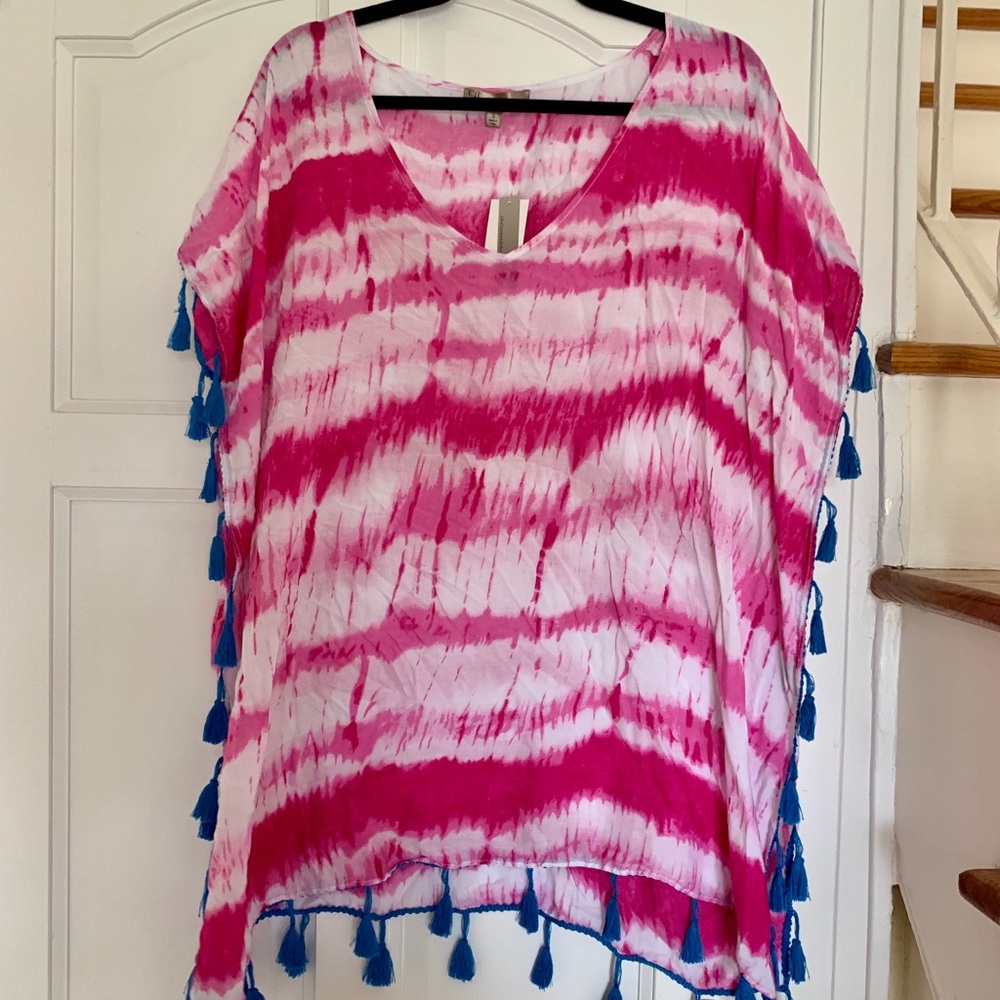Pink and white beach coverup with tassels
